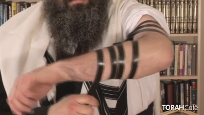 
	
		
			Blessing for the Tefillin:
		
			
			
		
			 
		
			Boruch ato Adonoy Elohay-nu Melech ho-olom asher kid’shonu b’mitzvosov v’tzivonu le'honiach Tefillin
		
			
			
		
			Blessed are you, Lord, our God, sovereign of the universe, Who has sanctified us with His commandments and commanded us to put on Tefillin
		
			
			
		
			
			
		
			Created by Raymond Lyons & Rabbi Nissan Dubov - Introduced by Chief Rabbi Lord Sacks - Produced by Jeremy Wootliff & Worthwhile